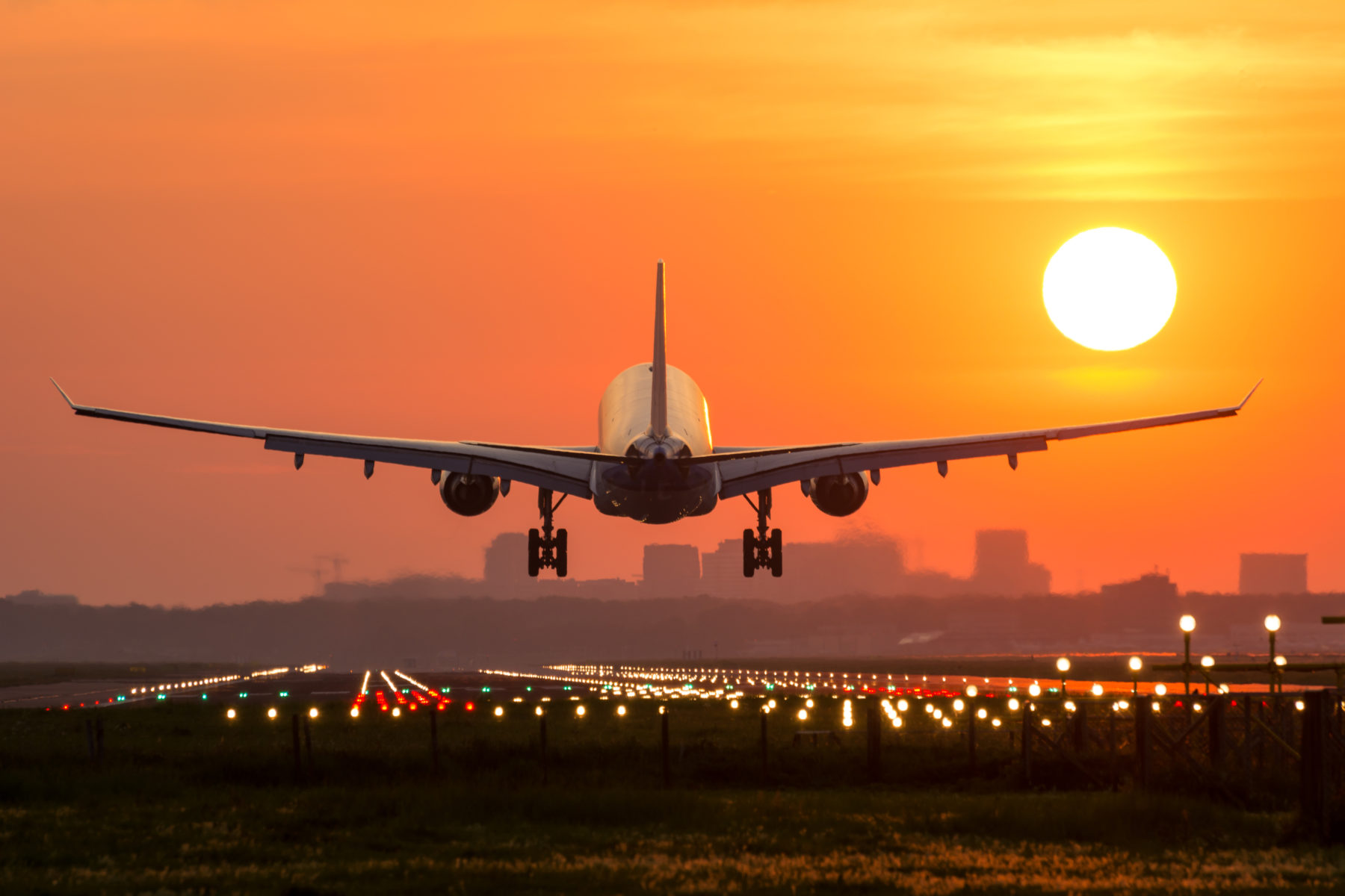 plane-taking-off-at-sunset-worldcare-travel-insurance